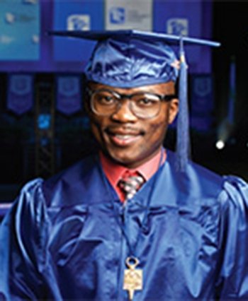 91Ӱ OSU Transfer Student Jonathan Akuma in blue graduation cap and gown.